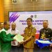Pj Bupati Seruyan Serahkan Sertifikat Redistribusi Tanah Dibeberapa Desa