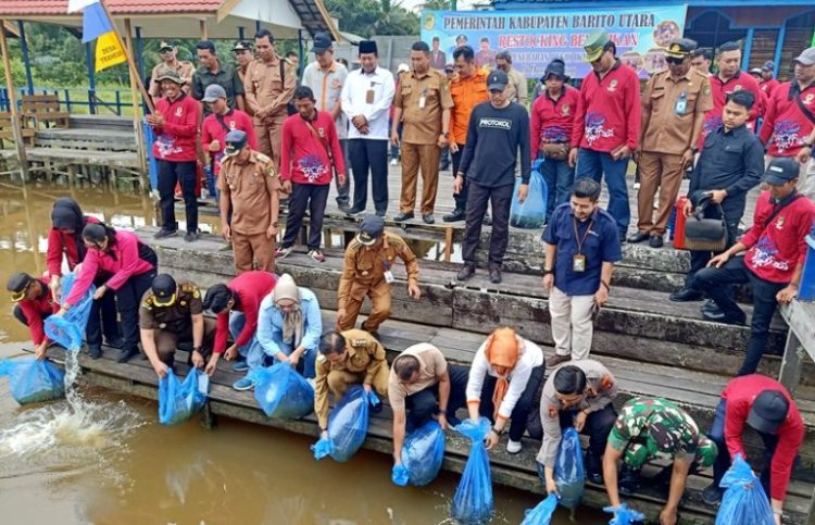 Dinas KPP Barut Restoking Benih Ikan di Perairan Umum DAM Trinsing