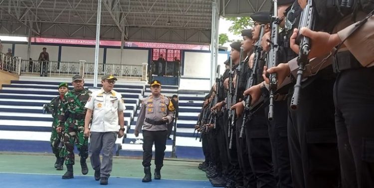 Pj Bupati Barut Pimpin Apel Gelar Pasukan pada PSU Pilkada Barut 2025