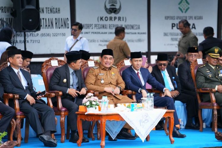 Hadiri Hari Bhakti ke 80, Bupati Barut Tegaskan  Pembangunan Infrastruktur Harus Merata